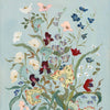 Colorful floral arrangement on a light blue background