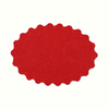 Red scalloped-edge placemat on a white background