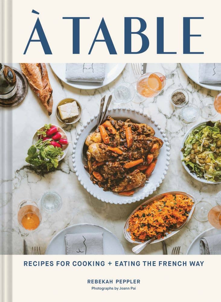 Cover of A Table recipes for cooking and eating the French way with food and bread on cover 