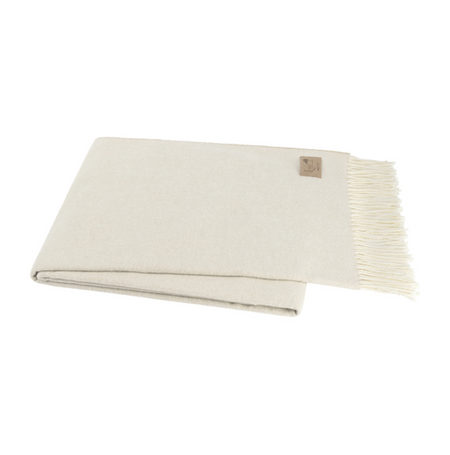 Beige blanket with fringe on a white background