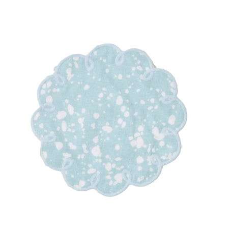 Floral pattern with a blue textured circle in the center