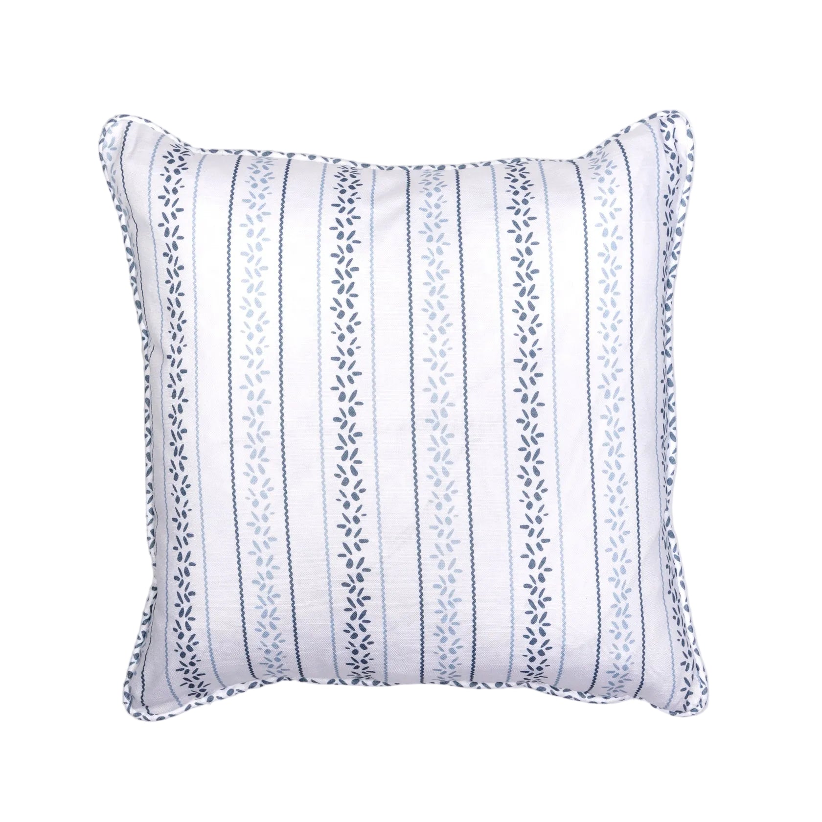 A square-shaped throw pillow with a blue floral petal pattern and a piped edge finish.