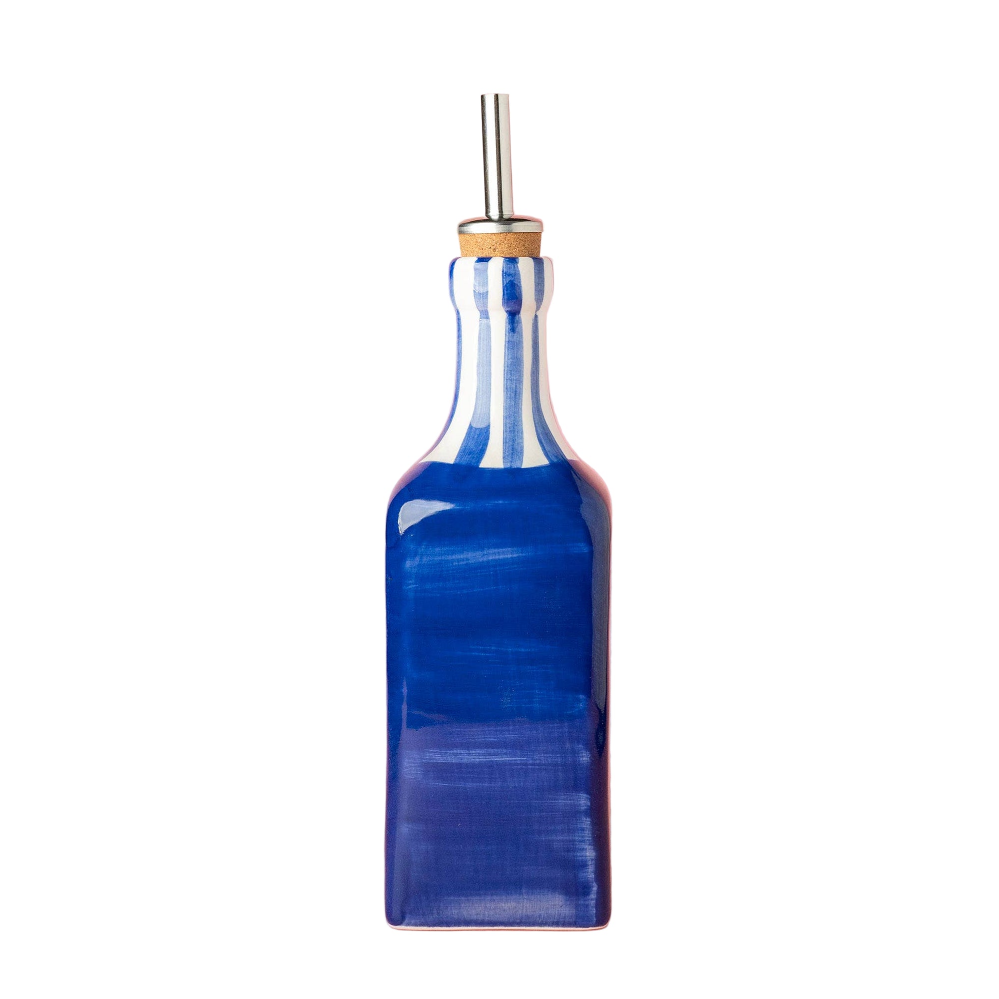 Blue glass bottle with a metal straw on a white background