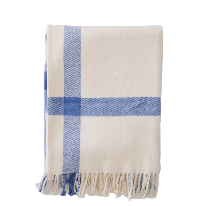 Plaid blanket with blue and beige colors on a light gray background