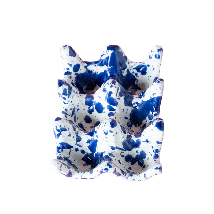 Blue and white ceramic dish on a white background