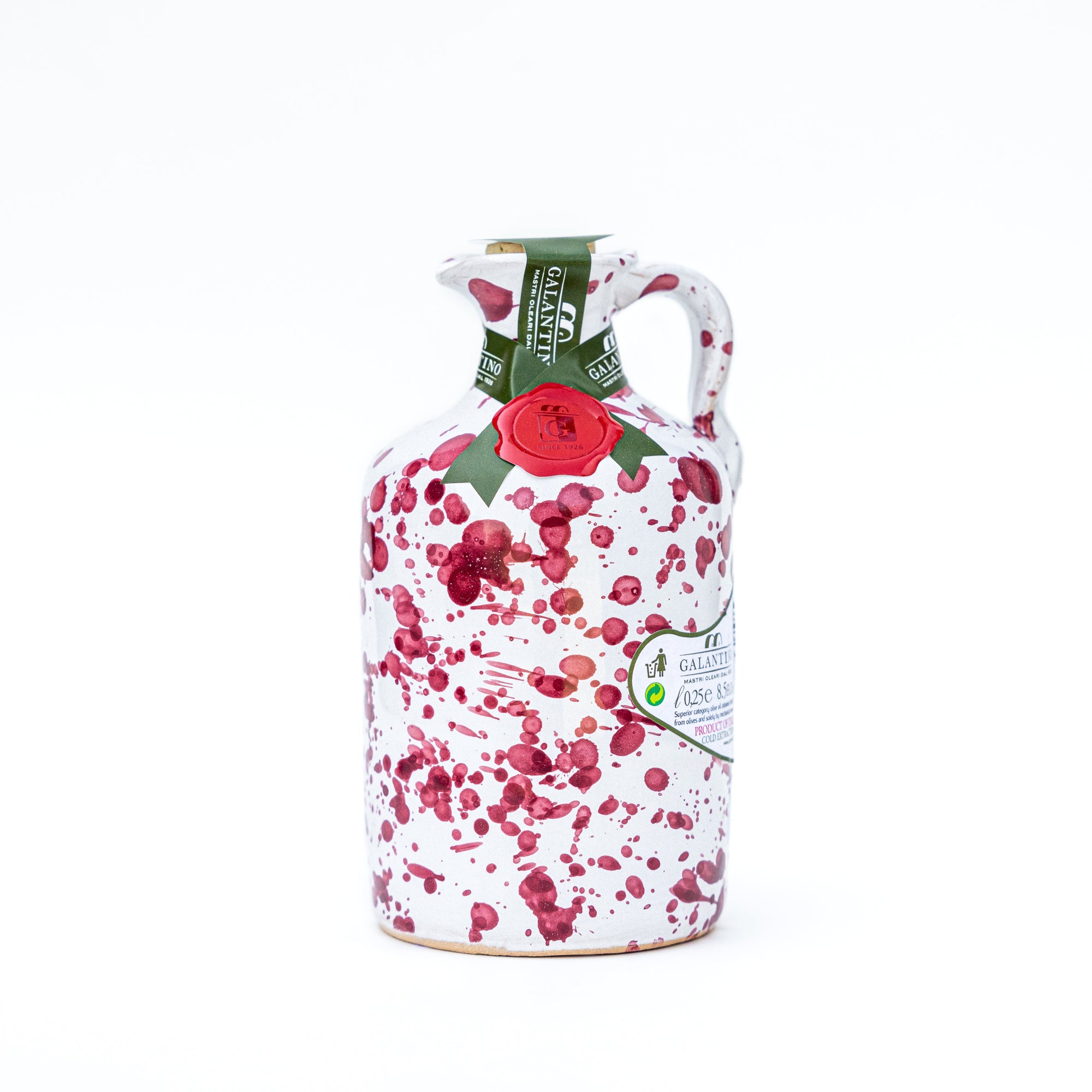 Bordeaux splatter ceramic bottle of extra virgin olive oil with cork on white background 