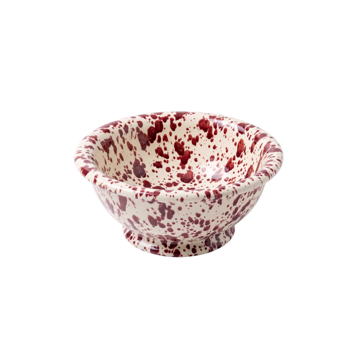 Homeport hand-thrown ceramic serving bowl in cream with a Bordeaux red splatter pattern and a classic rolled rim.