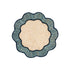 Round wavy placemat of natural fibers with sky blue edge on white background 