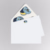 Set of stickers with a rocket design on a white card and envelope.