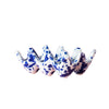 Ceramic egg holder with blue and white splatter-ware 