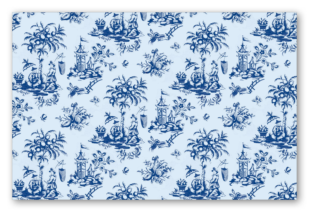 Paper placemats featuring blue and white motif centered around a traditional chinoiserie. 