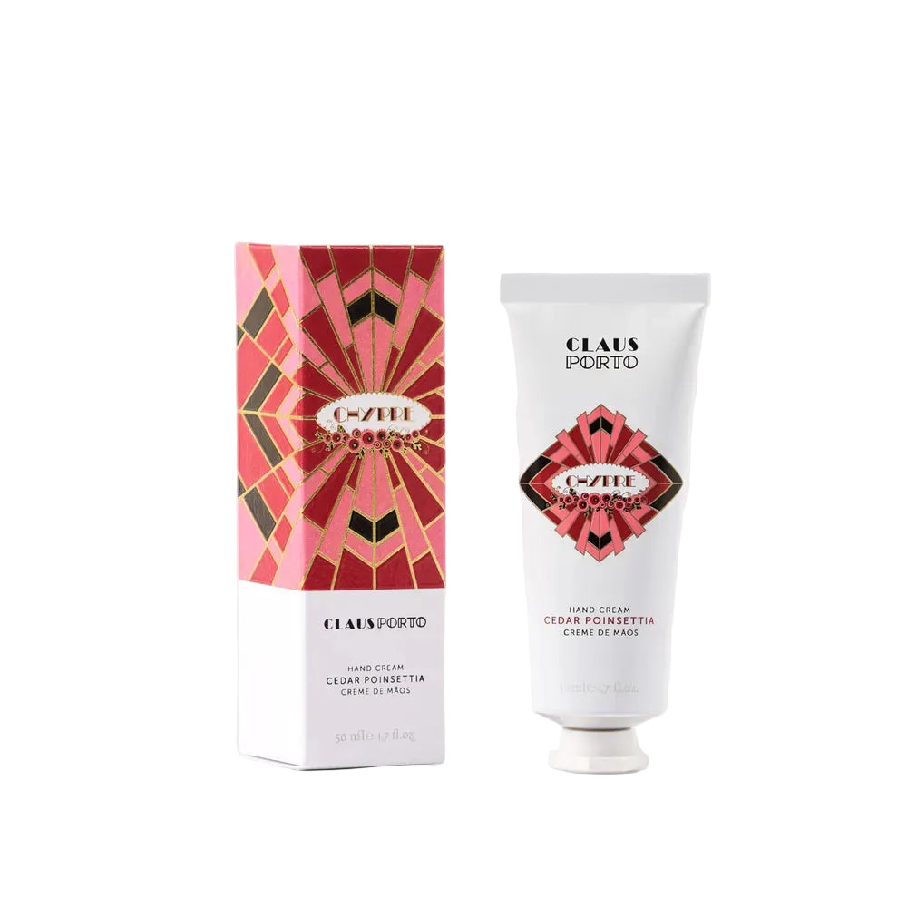 Claus Porto Cedar Poinsettia hand cream and packaging on a white background