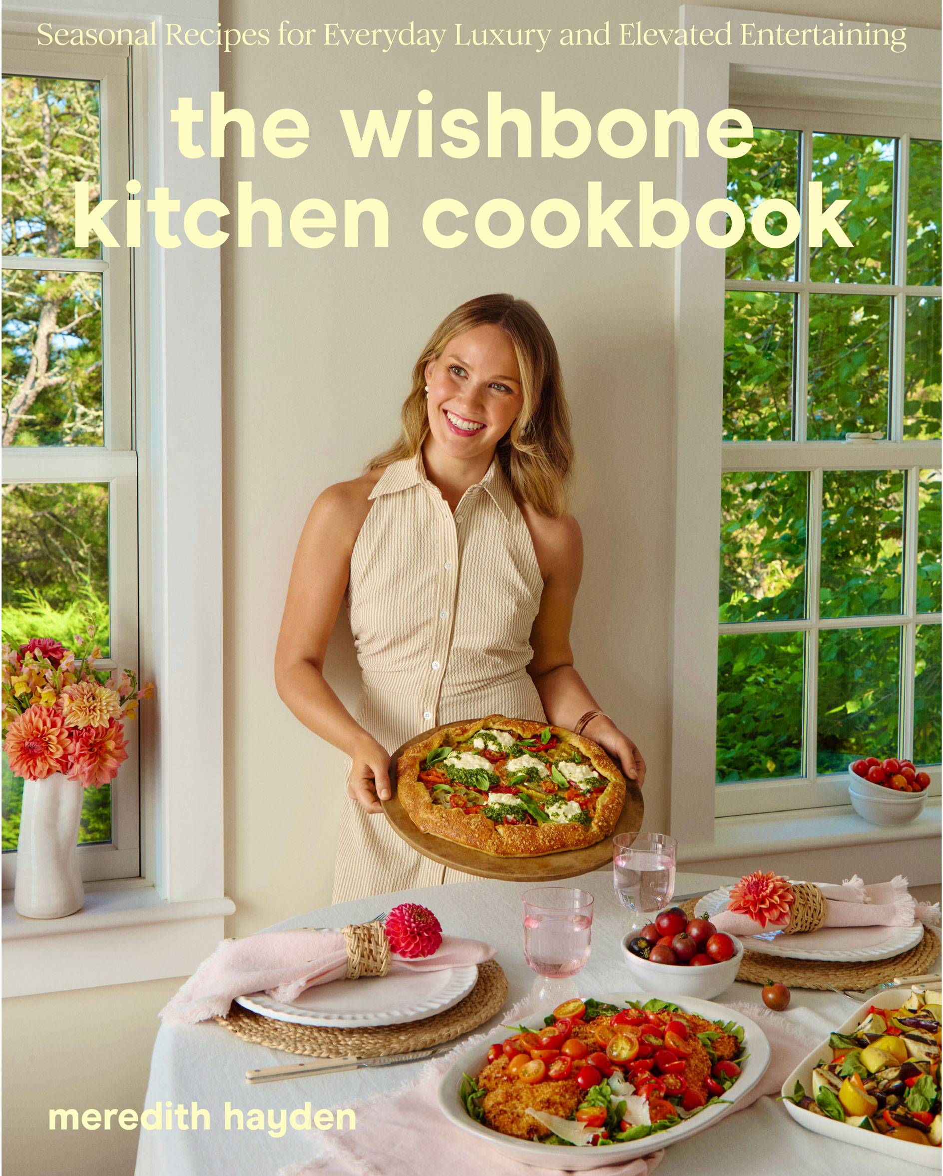 Wishbone Kitchen Cookbook cover with author Meredith Hayden in room with food 