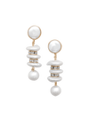 Pair of pearl earrings with gold accents on a white background