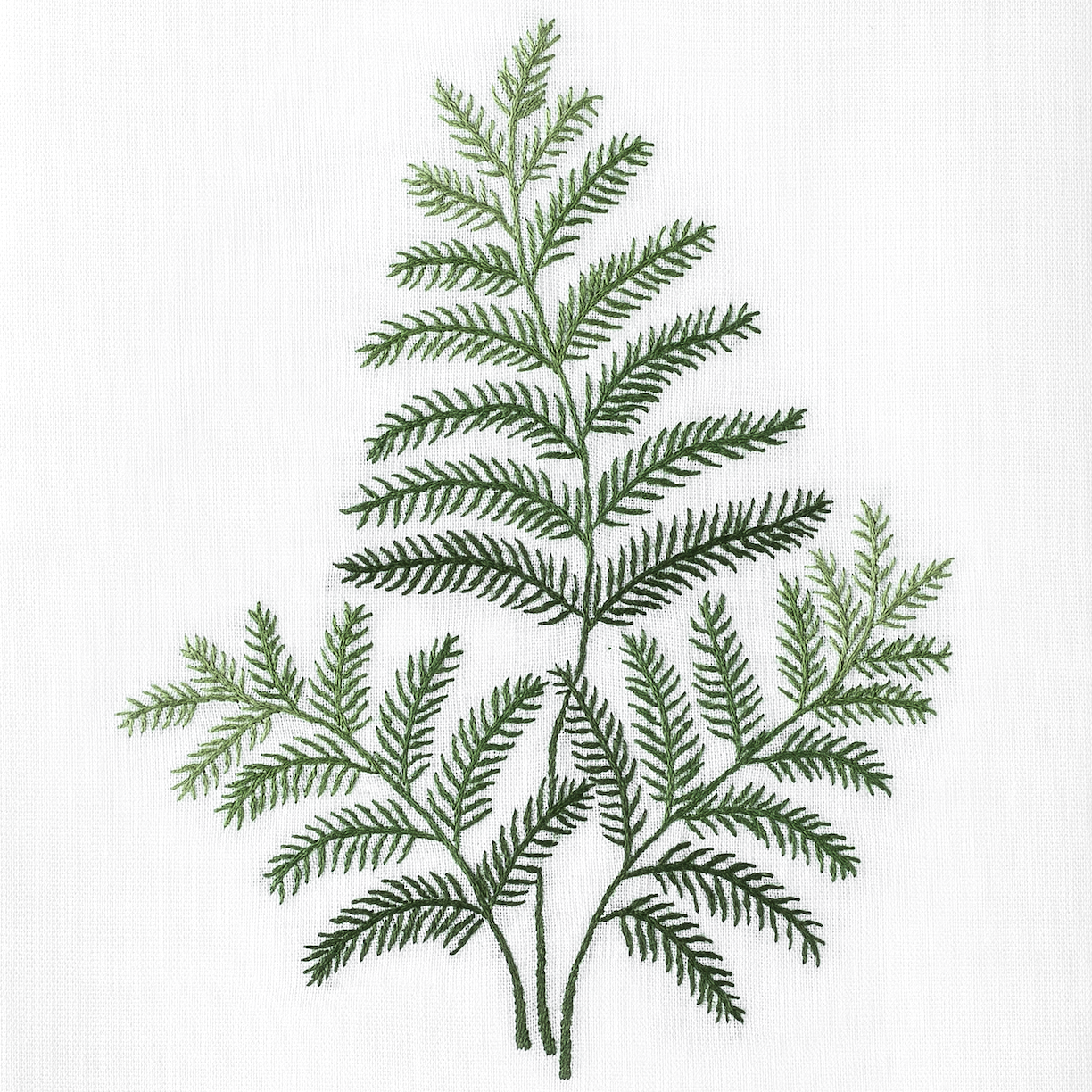Green leafy branch design on a white background