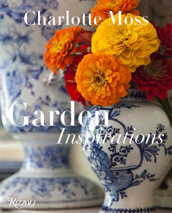 Cover of Charlotte Moss's Garden Inspirations with blue and white ginger jar with dalihas 