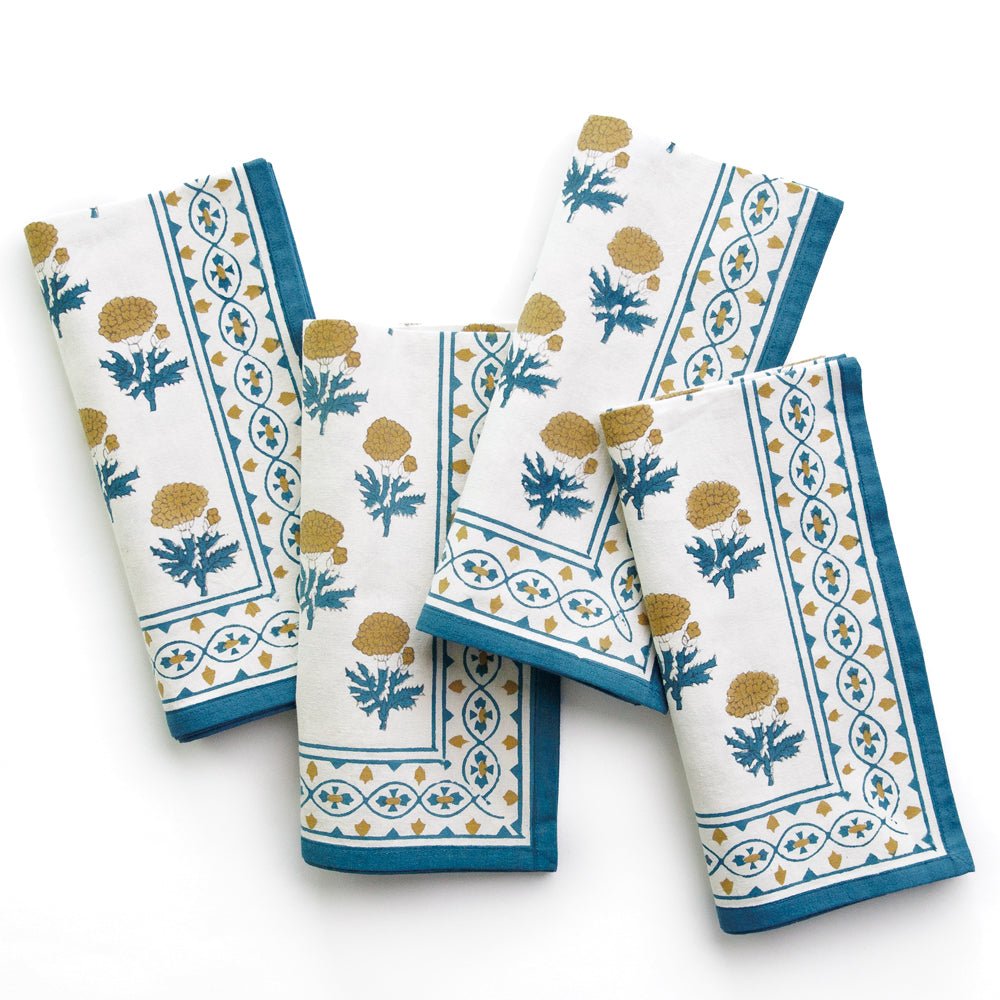 Block Print Teal and Marigold napkins on white background