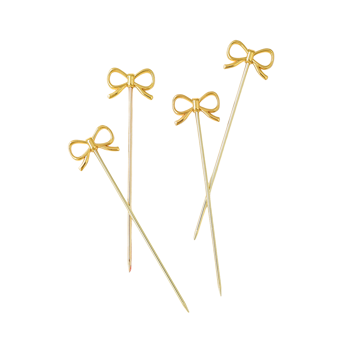 Four gold bow-shaped skewers on a white background