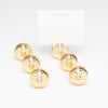 Set of gold bee hive containers with a 'Rockstar' card on a white background