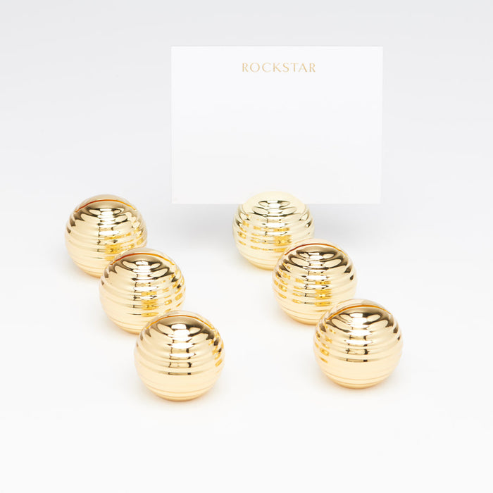 Set of gold bee hive containers with a 'Rockstar' card on a white background