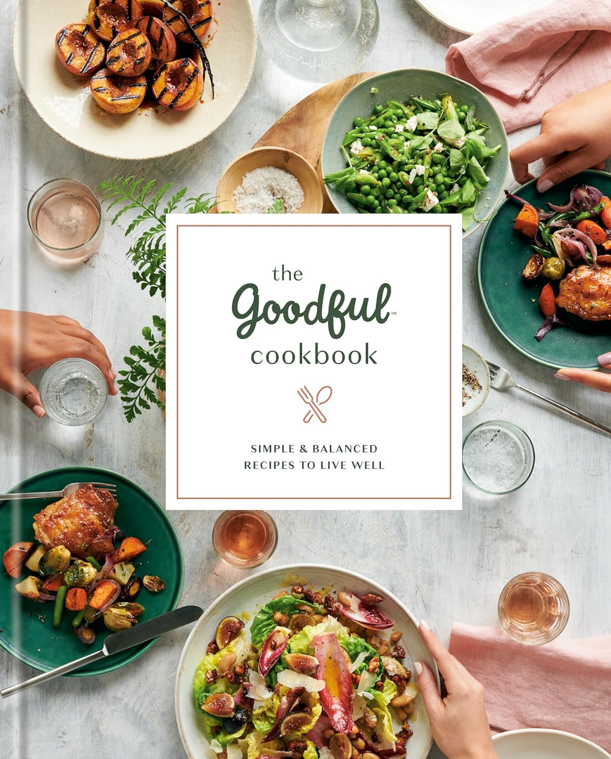 Cover of Goodful the Cookbook with plates and dishes of food