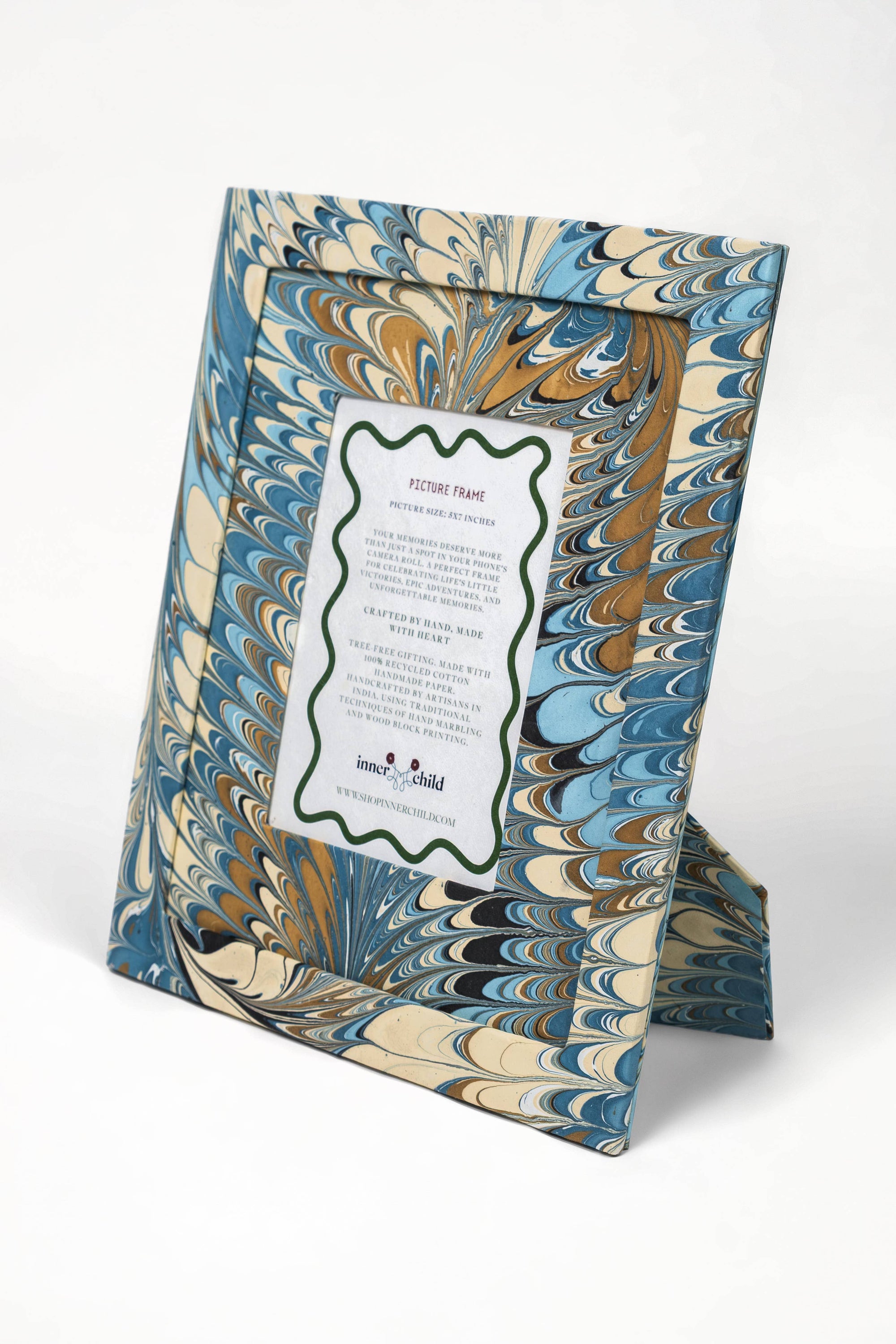 Hand marbled 4x6 picture frame in flatiron feathers on white background 