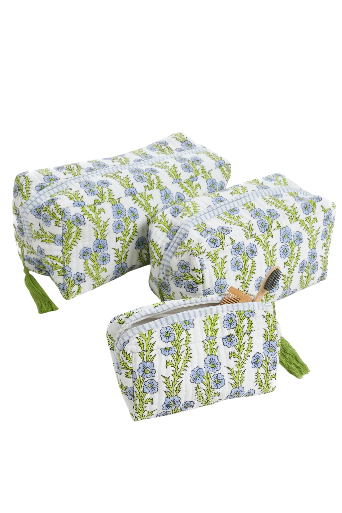 Block print Forget Me Not print cosmetic bags in small, medium and large with green tassel zipper 