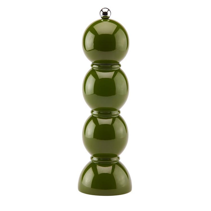 Green pepper grinder on a white background