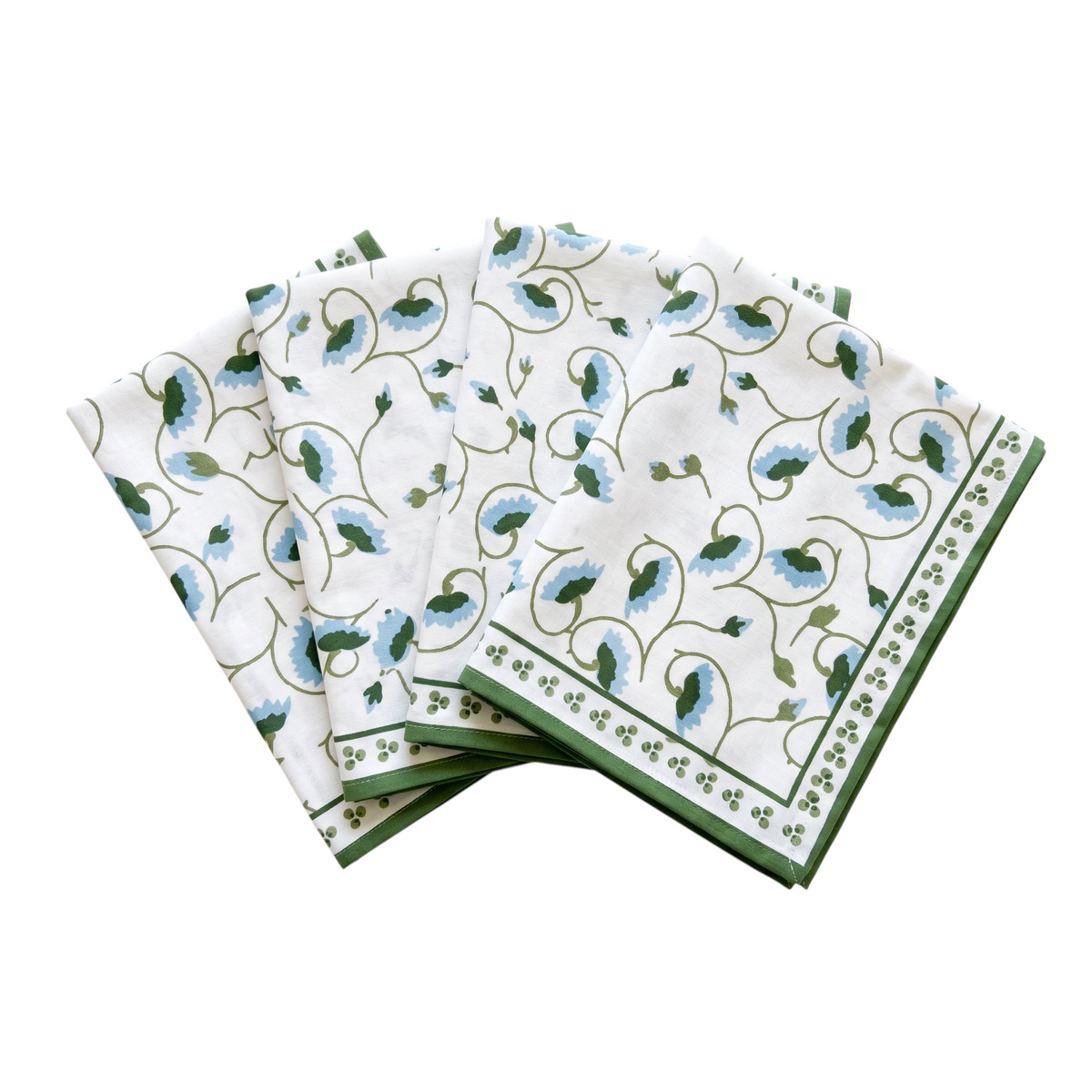 Homeport La Leccia cotton napkins featuring a blue and green floral vine print with a decorative border