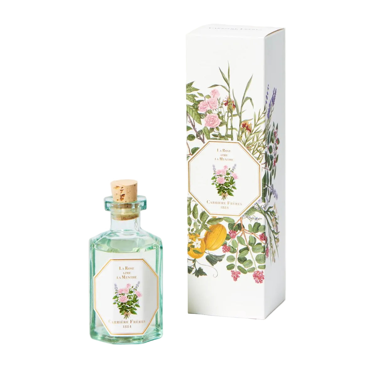 diffuser with a decorative box featuring floral designs on a white background