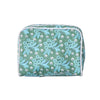 Floral-patterned fabric roll on a light gray background