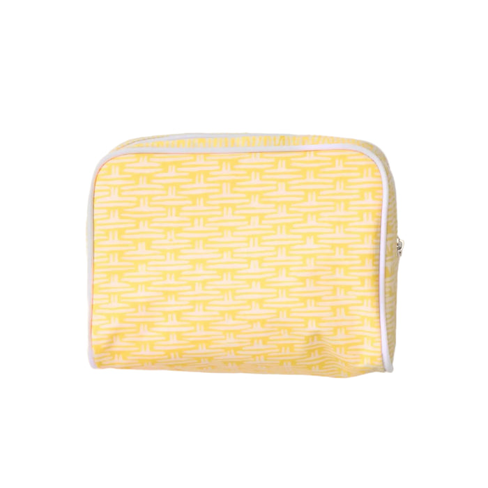 Yellow patterned pouch on a light gray background