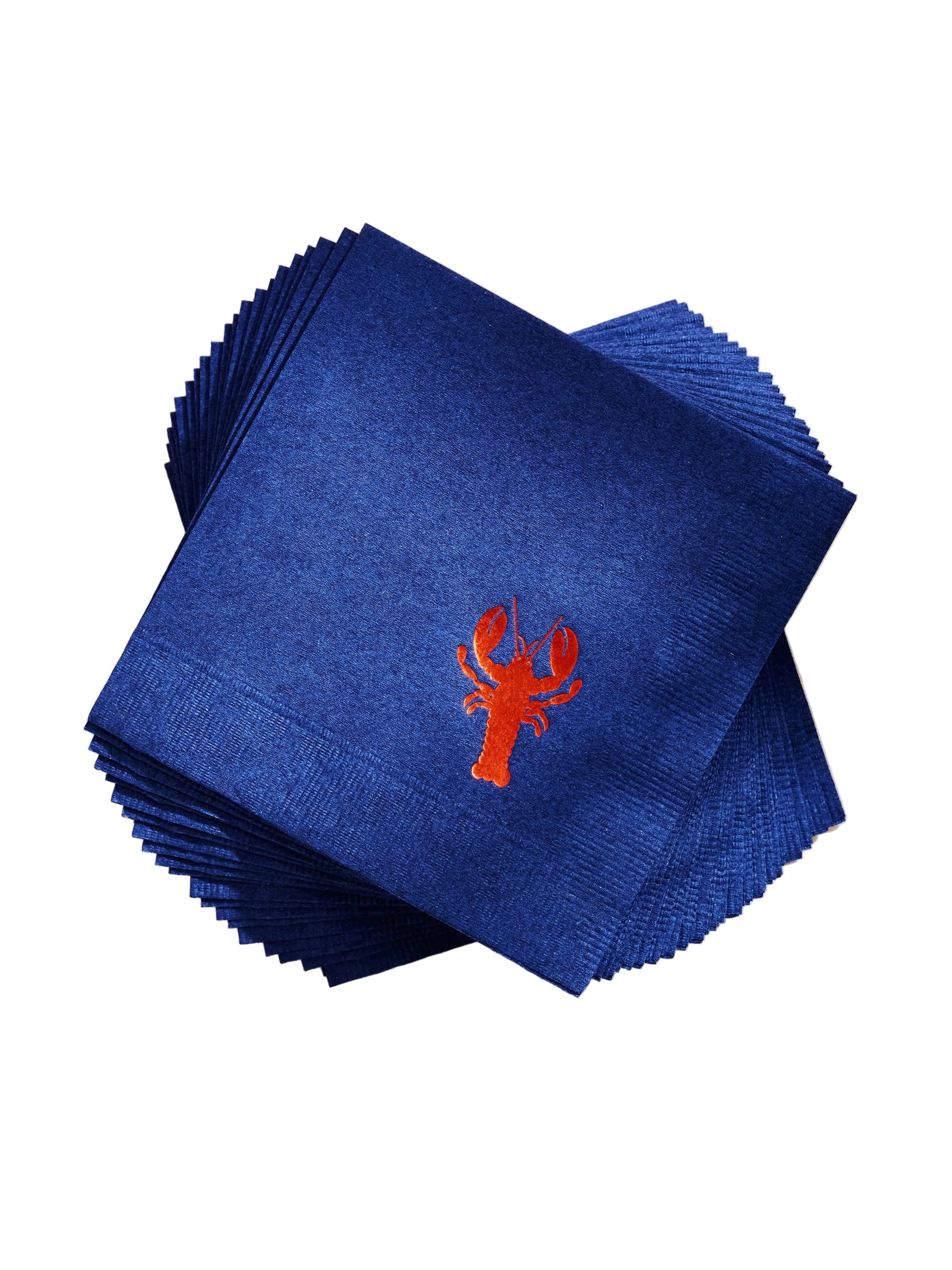 Stack of blue napkins with red lobster emblem on a beige background