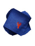 Stack of blue napkins with red lobster emblem on a beige background