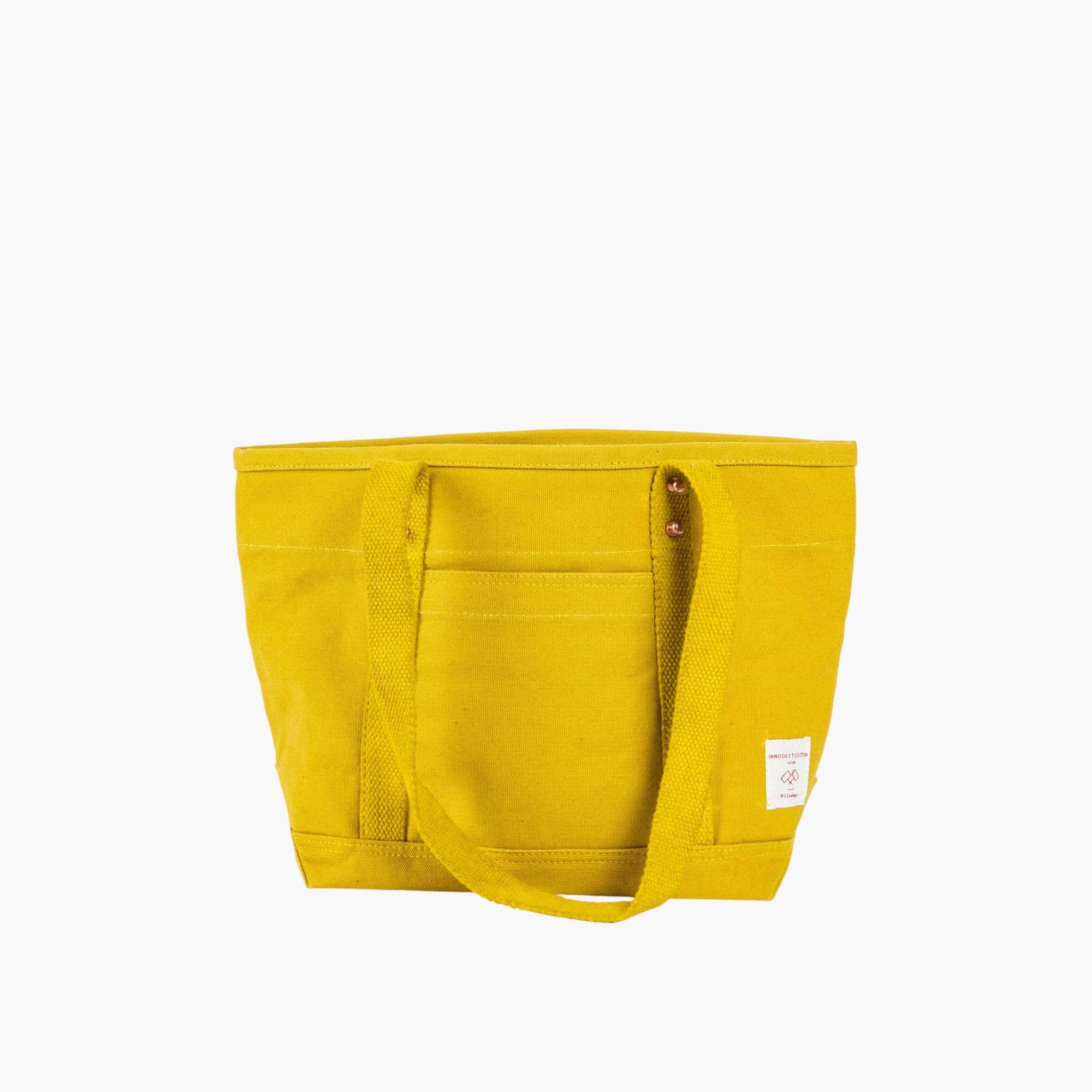 Lunch tote in Chartruese with shoulder straps and outside pocket on white background 