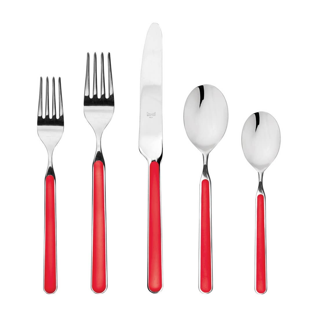 Red 5 piece flatware set with 2 forks, knife and 2 spoons on white background 