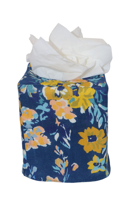 Floral-patterned tissue holder with tissues on a white background