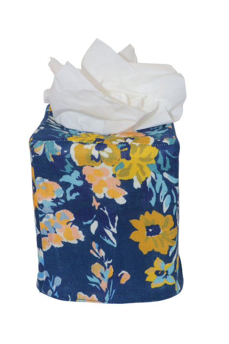 Floral-patterned tissue holder with tissues on a white background