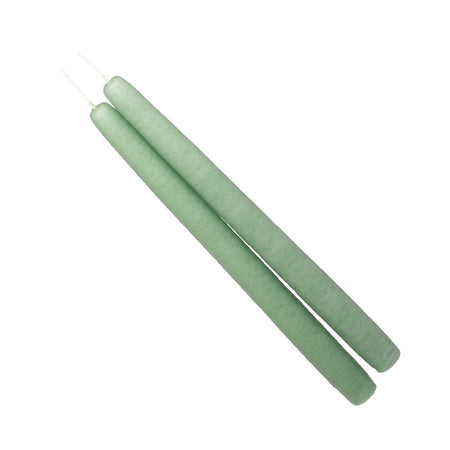 A pair of misty green taper candles connected by a wick.