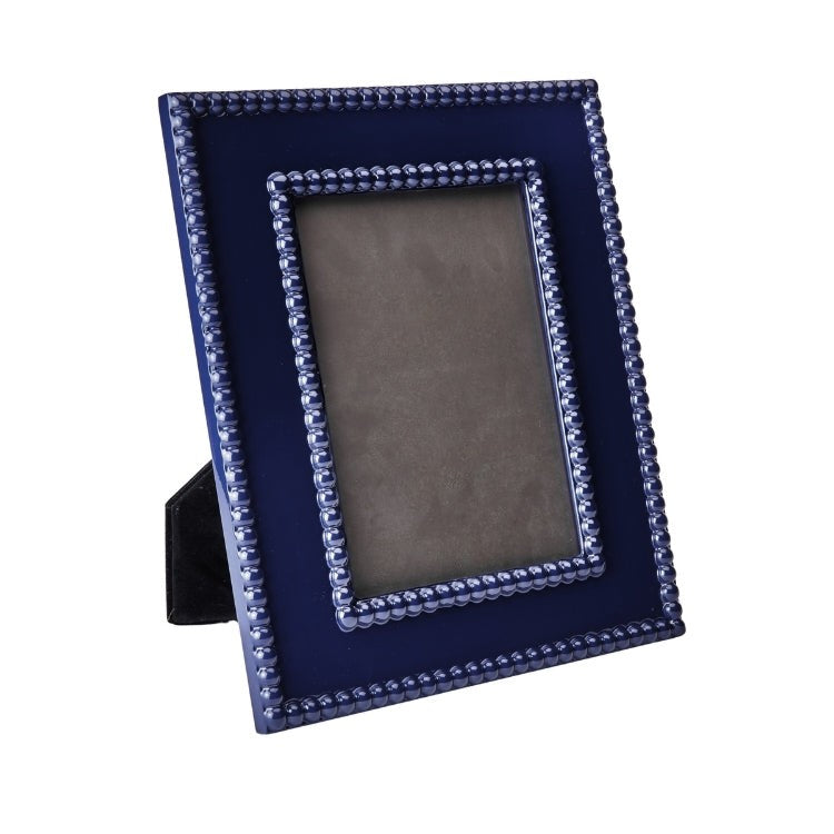 Navy Bobbin frame with lacquer finish on a white background 
