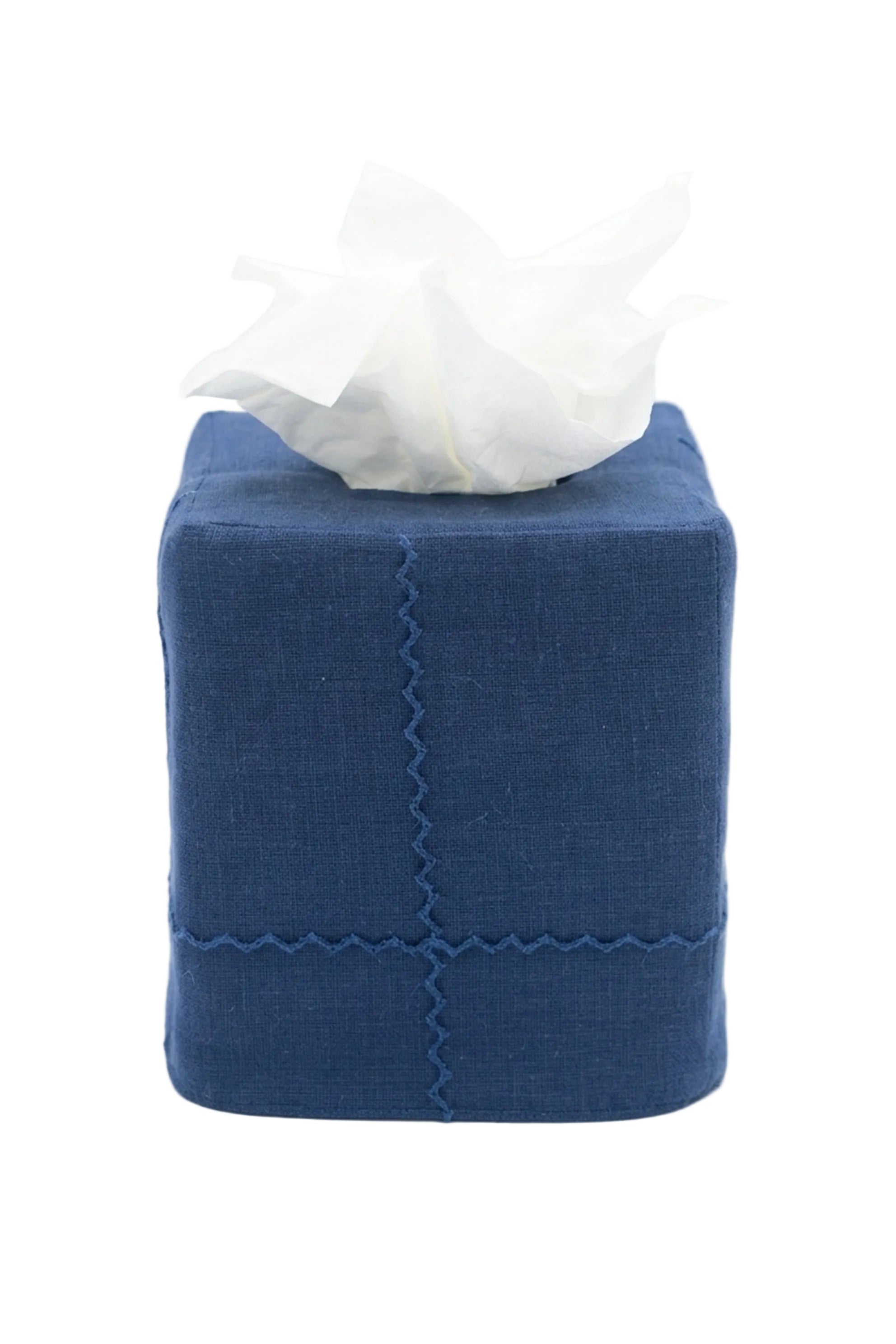 Linen navy tissue cover with ric rack design on white background
