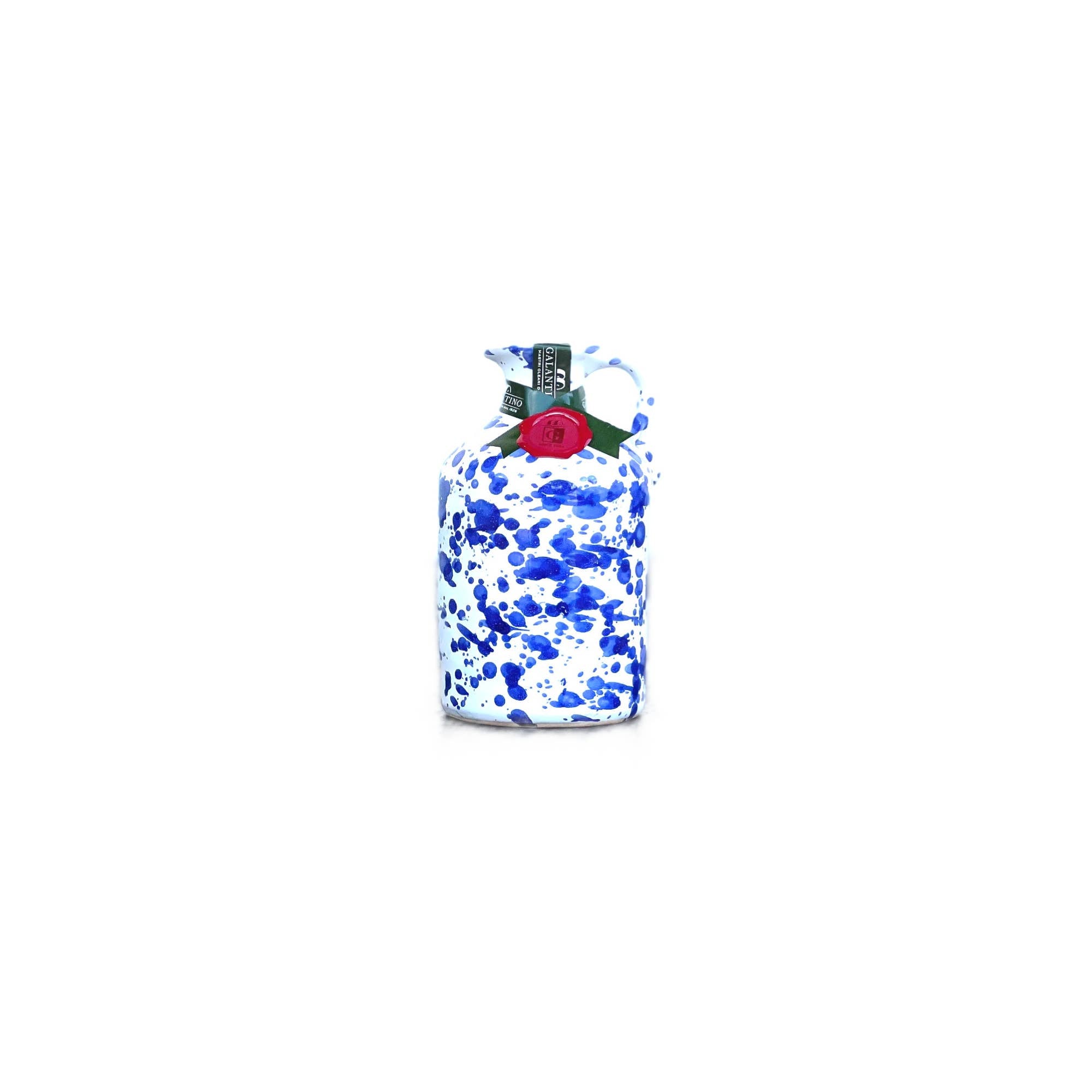 Small cobalt splatter ceramic bottle of olive oil with cork top on white background 