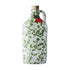 Green splatter ceramic bottle of extra virgin olive oil with cork top on white background 