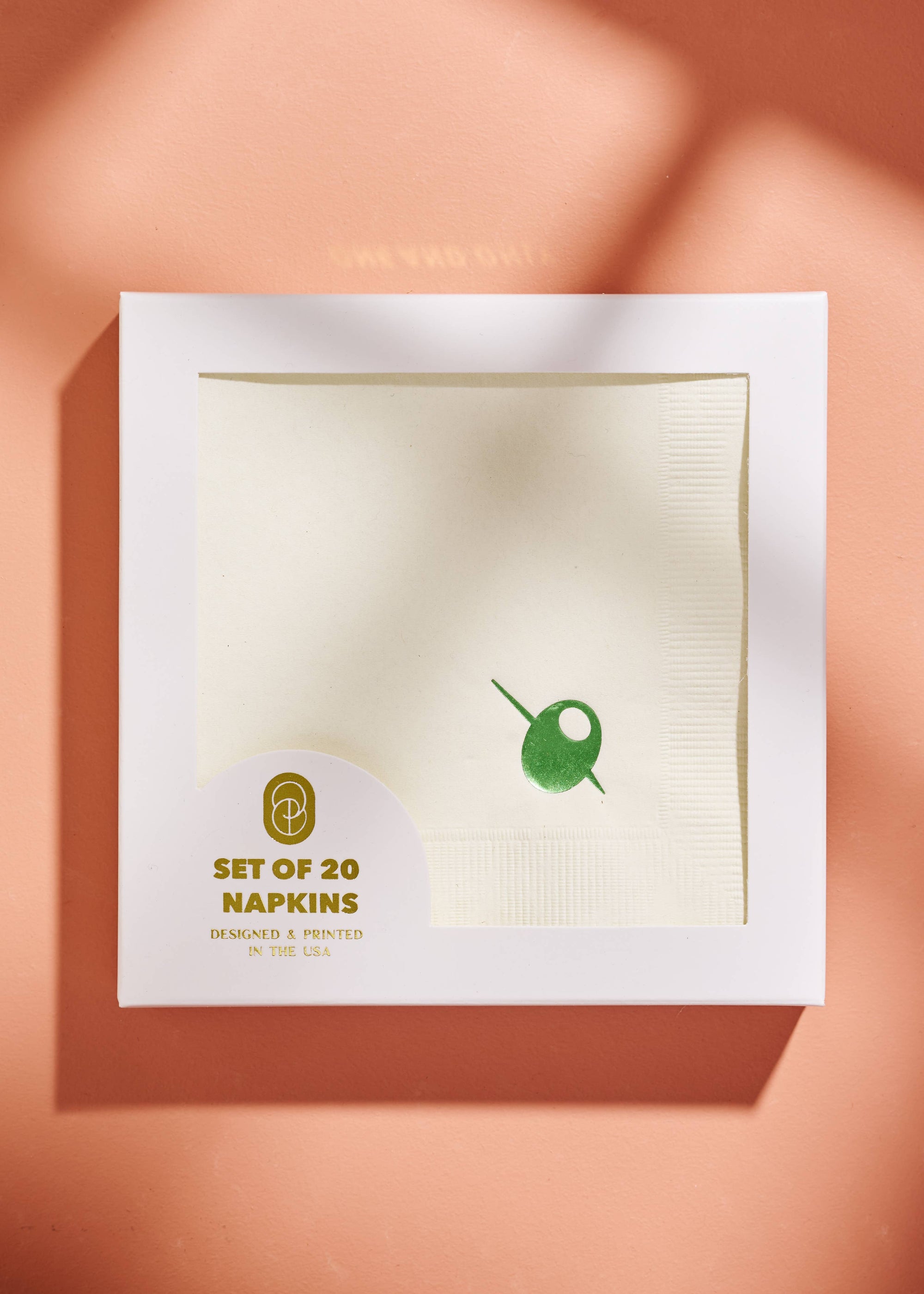 Set of 20 napkins packaging on a peach background
