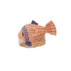 Woven fish-shaped napkin ring on a white background