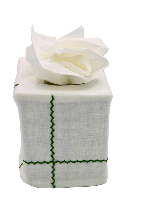 White tissue box cover with green line pattern and a 