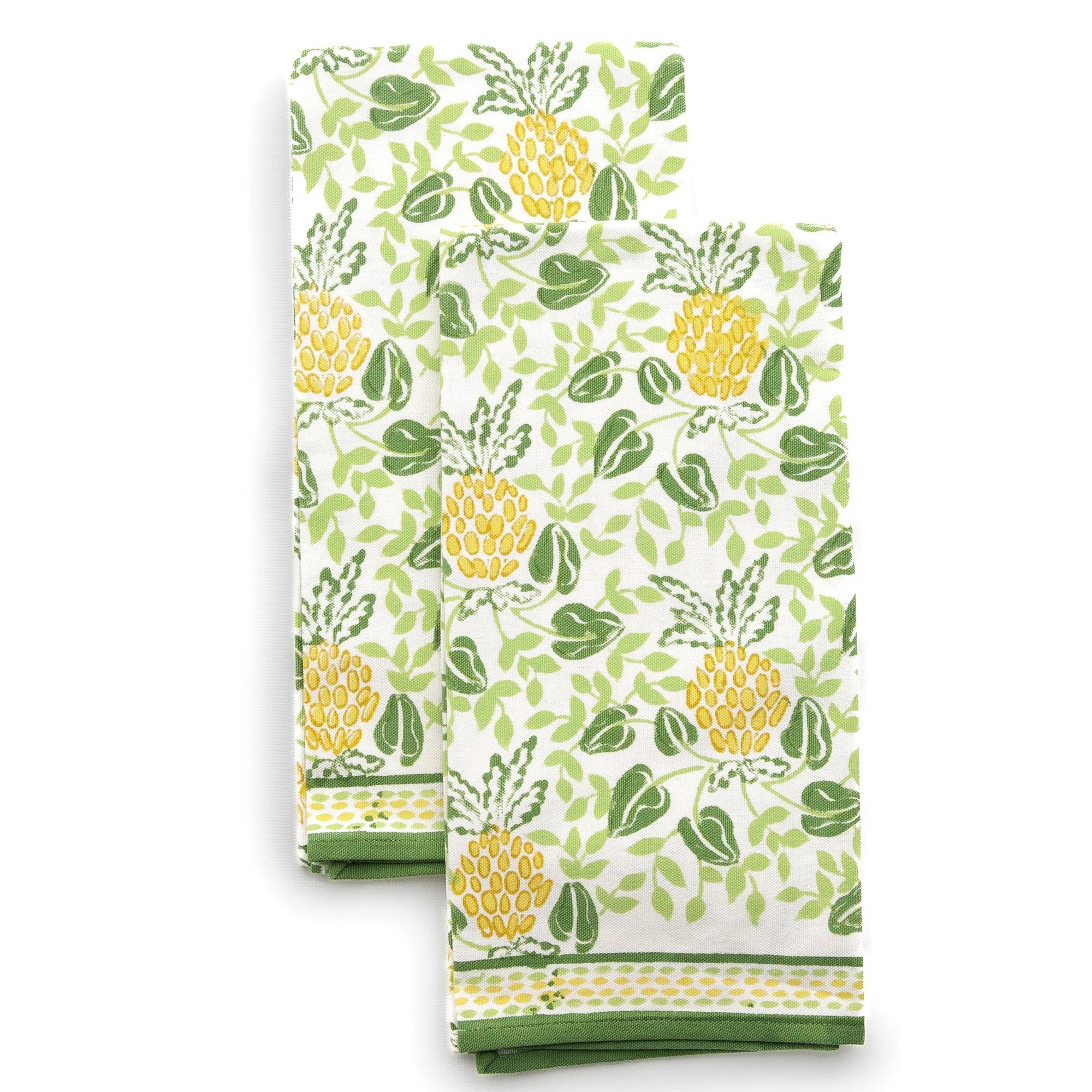 Two kitchen towels with pineapple pattern on a white background