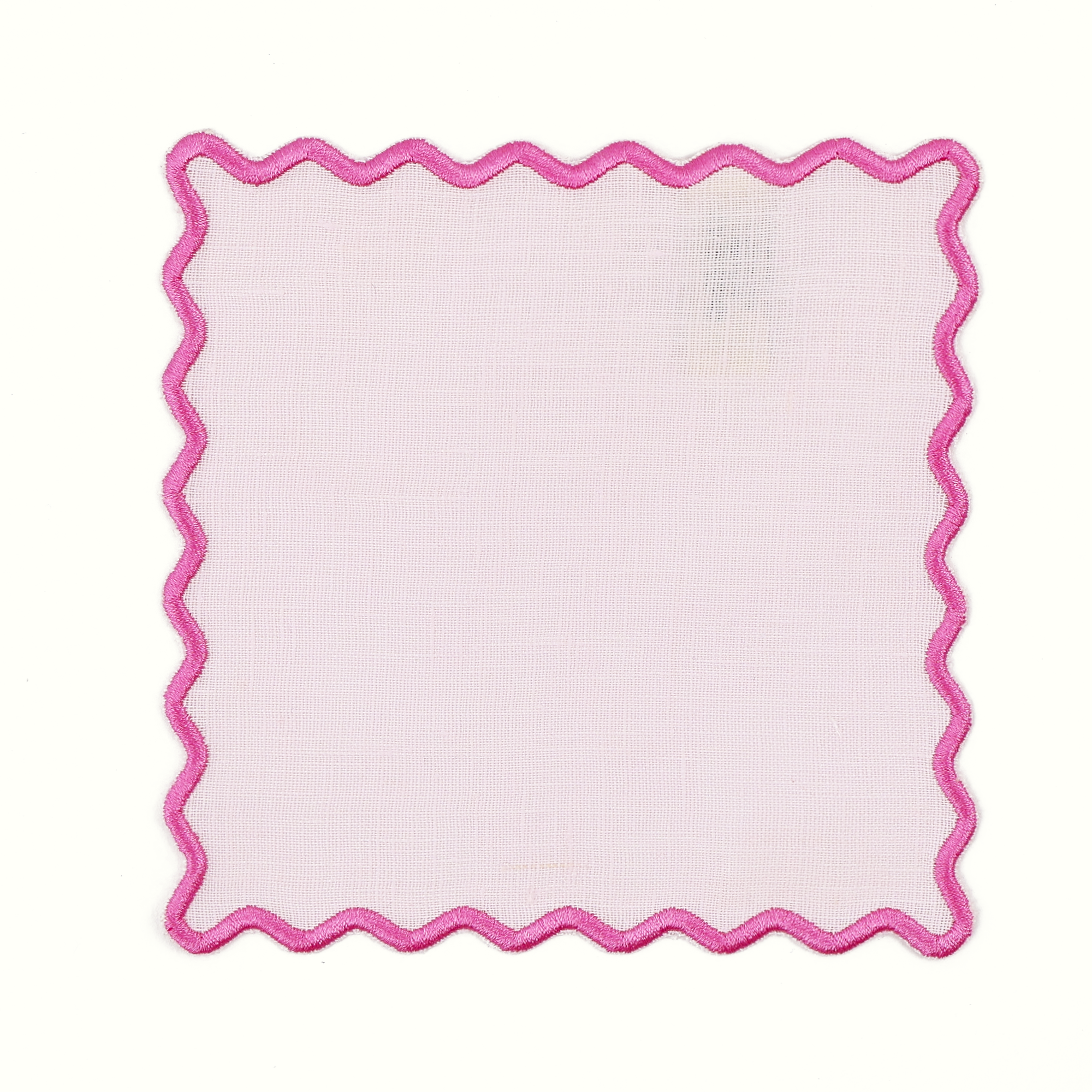 Light pink linen square cocktail napkin with darker pink scalloped edge on white background 