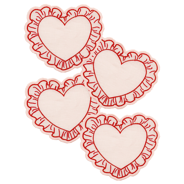 Four pink hearts with red ruffled edges on a white background