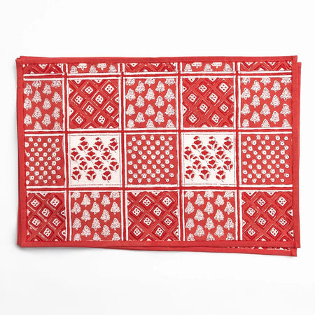 Red bandana with white patterns on a white background